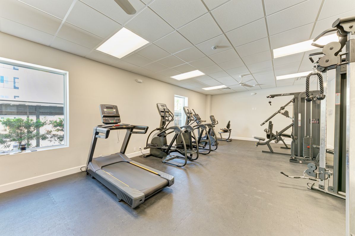 Fitness center with treadmill, ellipticals and strength equipment