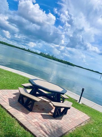 Picnic table on the seawall overlooking Sarasota Bay